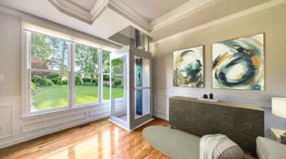 Residential Elevator in furnished, brightly lit first floor living room