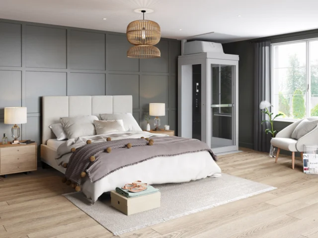 Pollock elevator in the corner of a bright bedroom with a made bed and greenish wall.