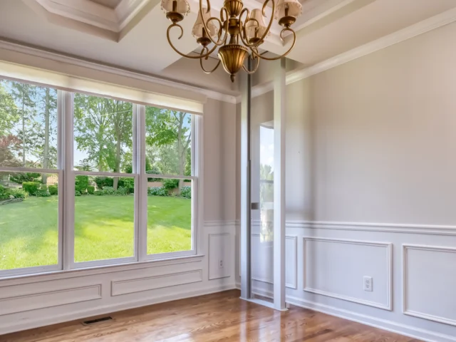 Shaftless elevator showcasing the two rails while the cabin is on the second floor.