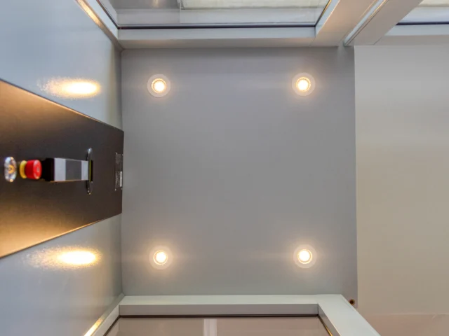 Four LED lights on the ceiling of the Pollock elevator