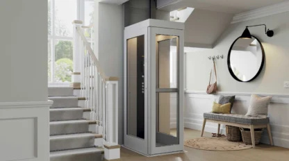 Residential elevator on first floor beside stairs