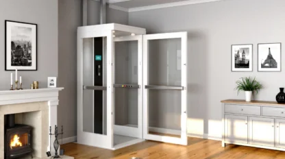 A white, medium-sized home elevator sits in the corner of a living room with its door open.